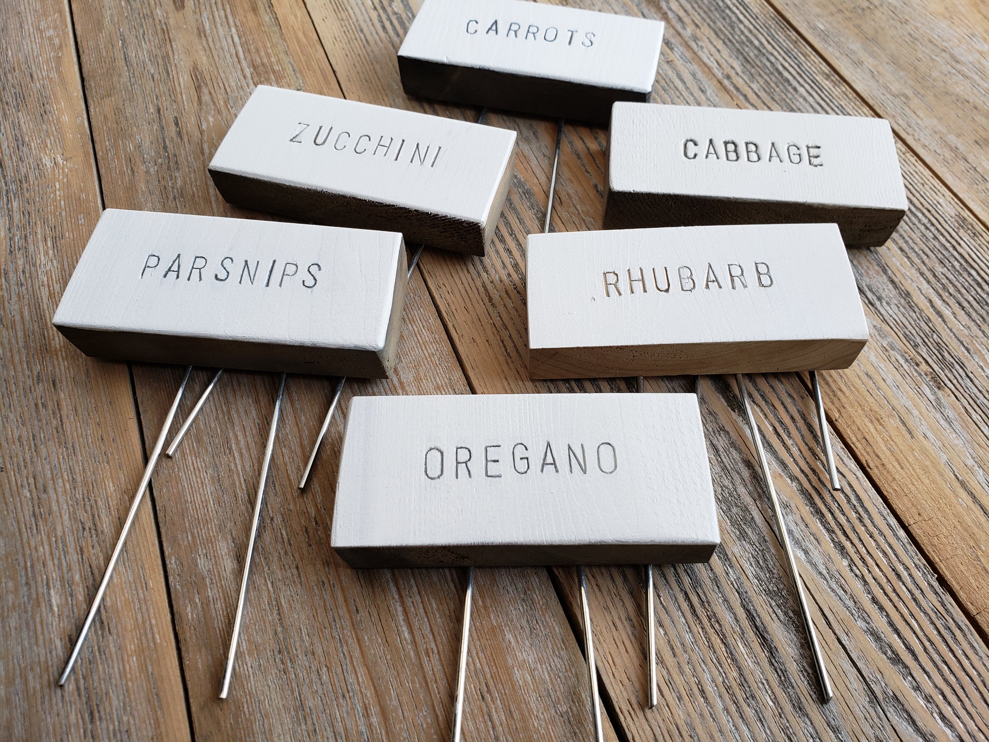 set of 6 rustic white garden markers with vegetable and herb names etched on each 