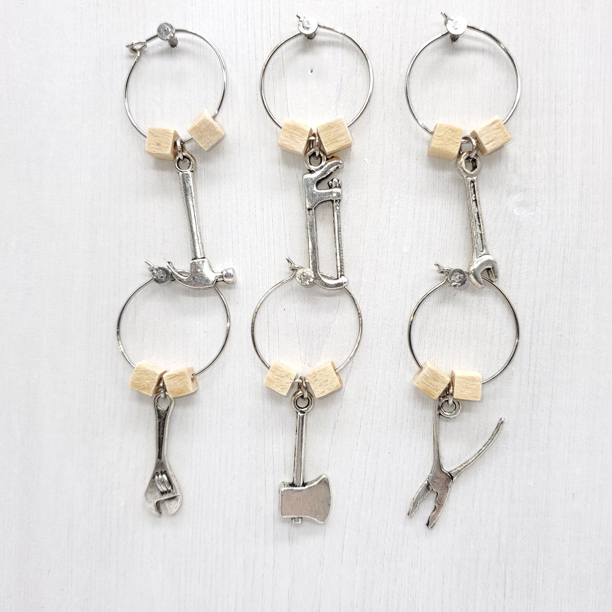 set of 4 handyman tools wine charms; hammer, hand saw, wrench, pliers, ax, combination wrench with wooden square beads