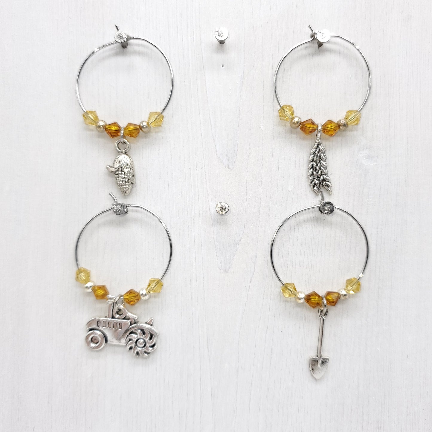 set of 4 wine charms with crystal beads, corn, wheat, tractor and shovel