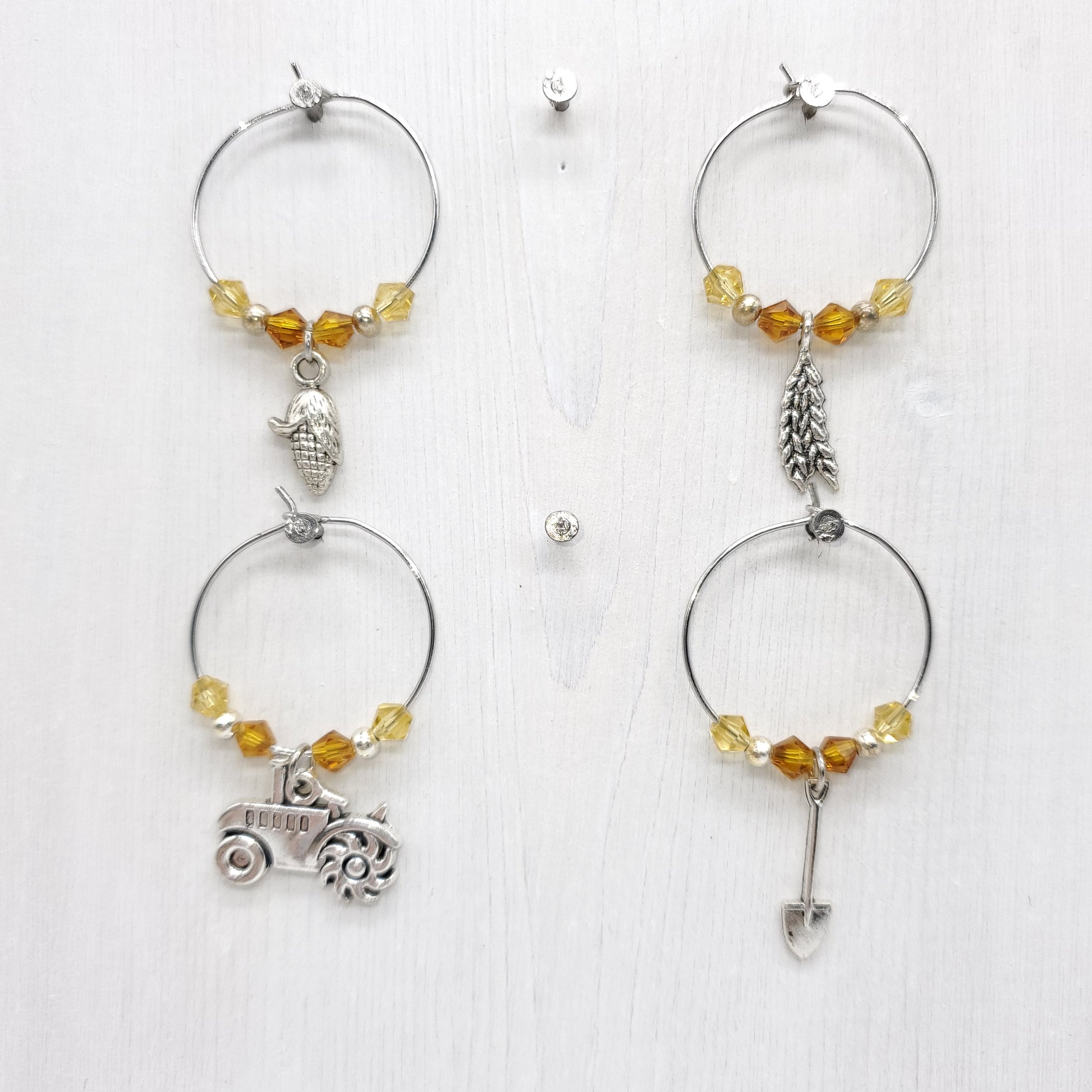 set of 4 wine charms with crystal beads, corn, wheat, tractor and shovel