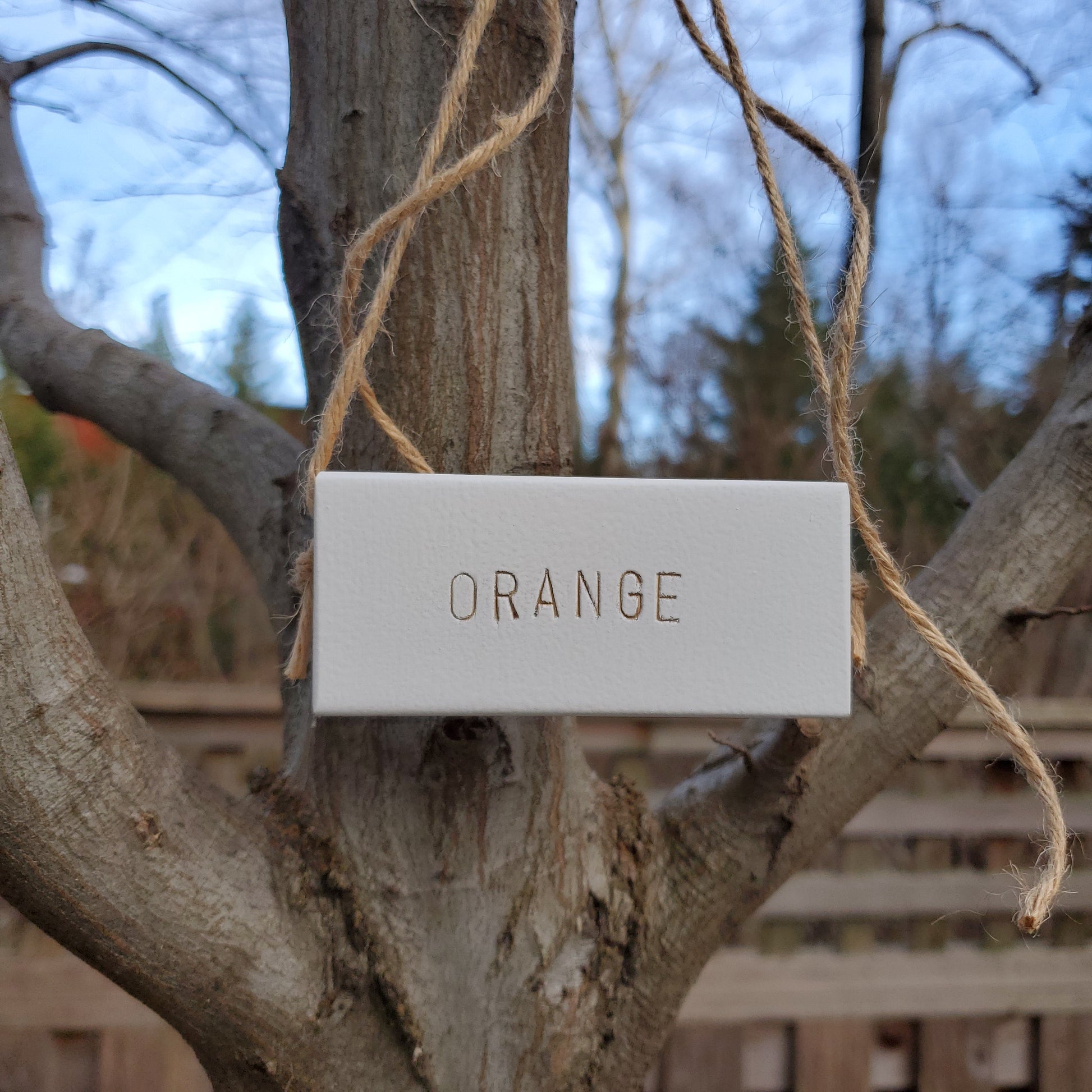white orange tree marker